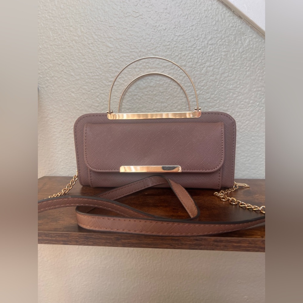 Chic Mauve-y brown wallet with chain strap.